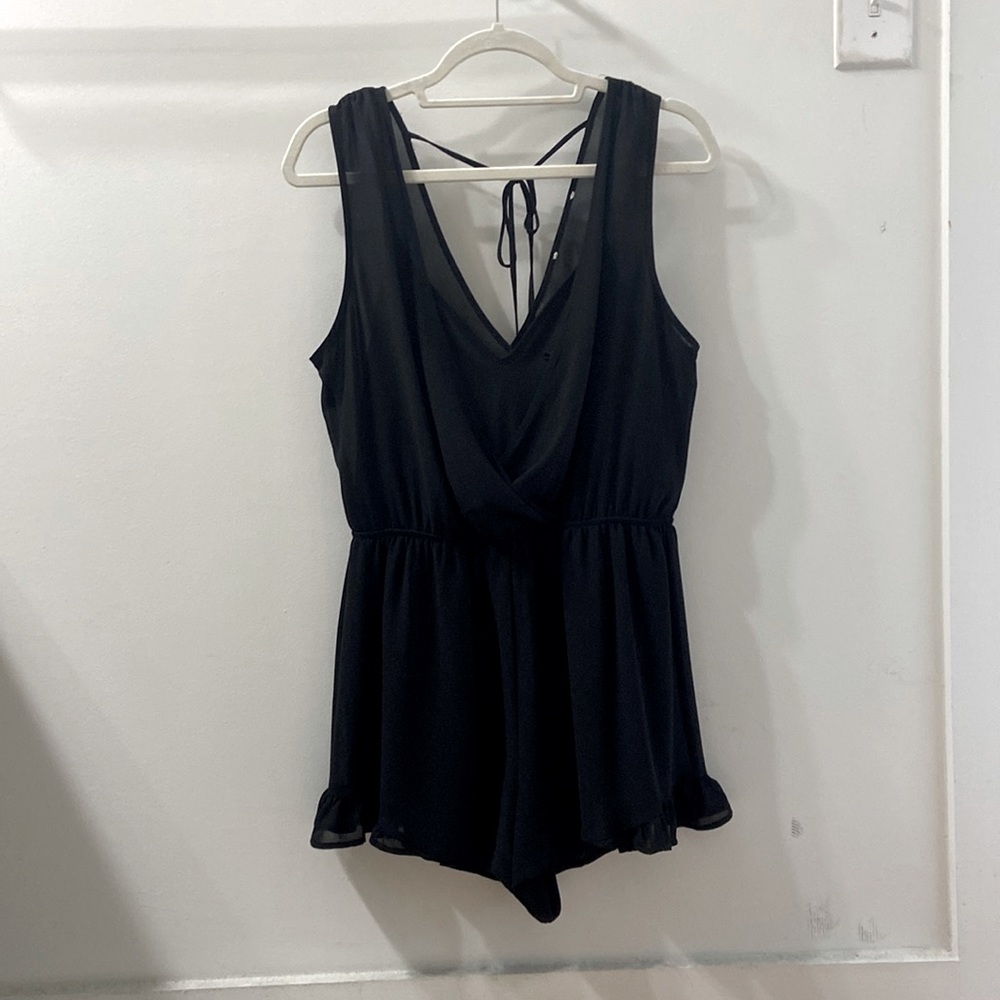 Black romper. Attached slip with sheer cover